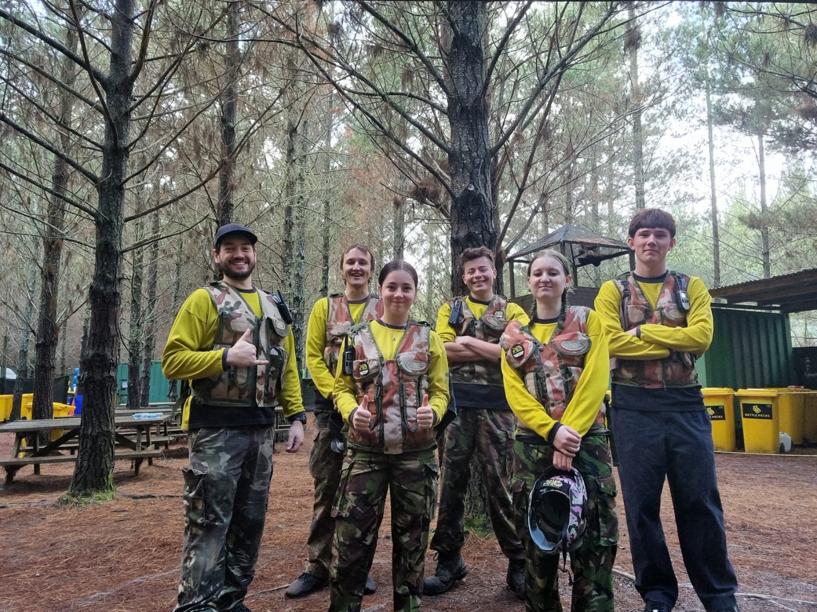 A Delta Force marshal team together at a woodland paintball centre
